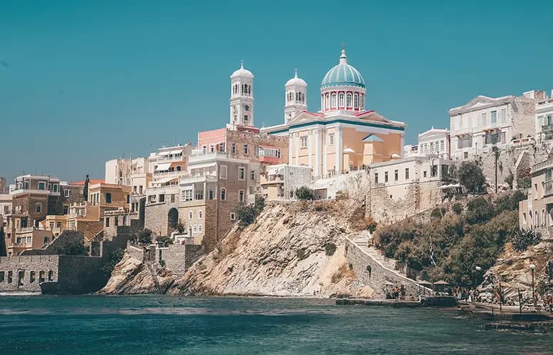 Exploring the Architectural Tapestry of Syros: From Neoclassical Grandeur to Medieval Charm