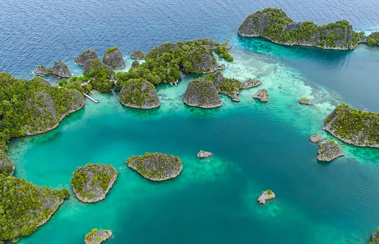 Traveling to Raja Ampat, Indonesia? How Your Choices Shape Its Future